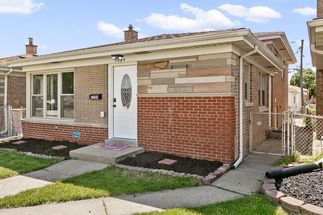 Building Photo - 7704 McVicker Ave