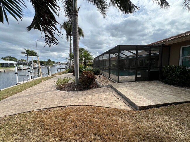 Building Photo - Furnished ** Punta Gorda Isles Vacation Home ** Heated Pool ** Canal / Boat Dock ** $7,500