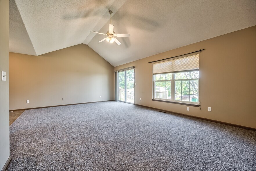 2nd floor living room with vaulted ceiling - 11220 W 61st St