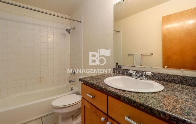 Building Photo - Spacious Riverfront Condo- Beautiful Condo w/River View from Bedroom! Parking Included!