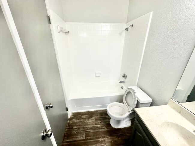 Building Photo - NEW IN MANAGEMENT - AVAILABLE NOW!