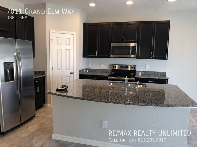 Building Photo - 7011 Grand Elm Dr