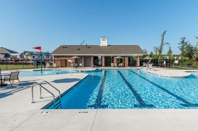 Building Photo - Main Floor Owner's Suite PLUS Main Floor G...