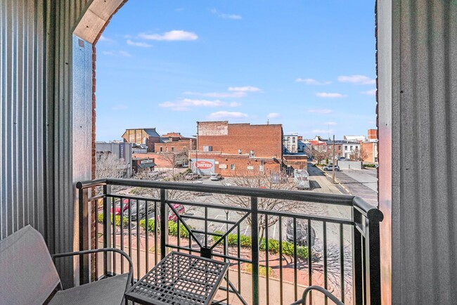 Building Photo - Stylish Top-Floor Corner Condo in Downtown...