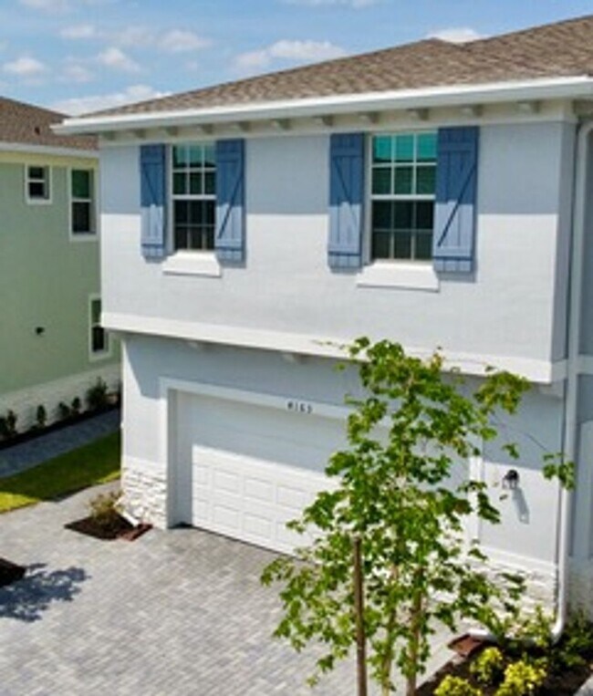 Building Photo - Brand new Townhome centrally located in La...