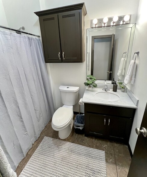 Guest bathroom. - 801 E Daffodil