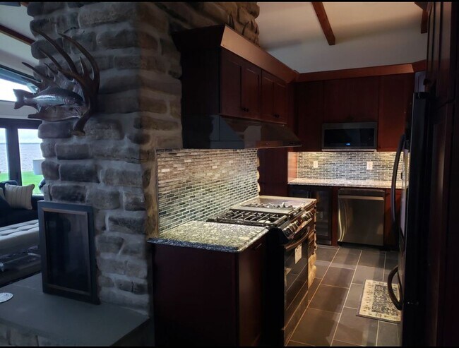 Building Photo - Offered for Rent – Available April 1, 2026 St. Lawrence Seaway Luxury Waterfront Home – Cape Vinc...