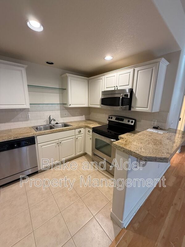 Building Photo - 8758 NE Delamere Way