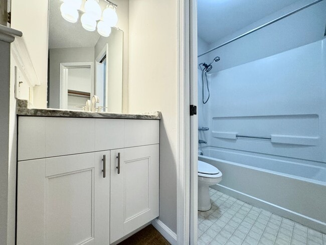 Building Photo - Updated 1st Floor/1-Level Condo Available NOW & Rent Includes Water, Sewer, Trash, Landscaping, F...