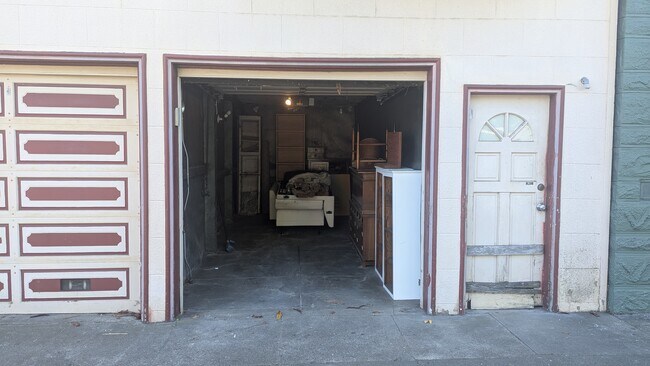 Dimensions 7'H + 12'L. Delivered empty. - 1201 Willard St