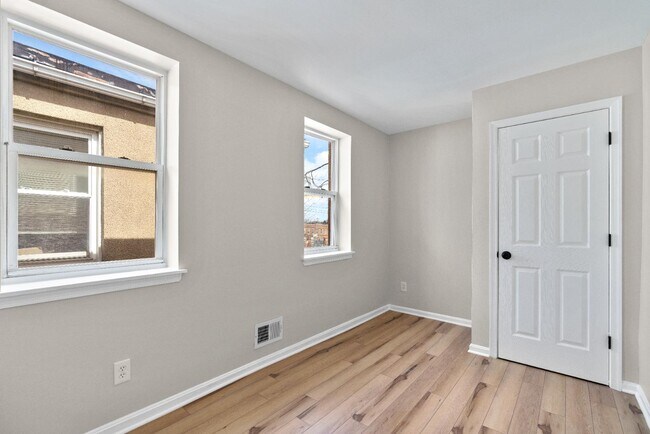 Building Photo - 223 N Patterson Park Ave
