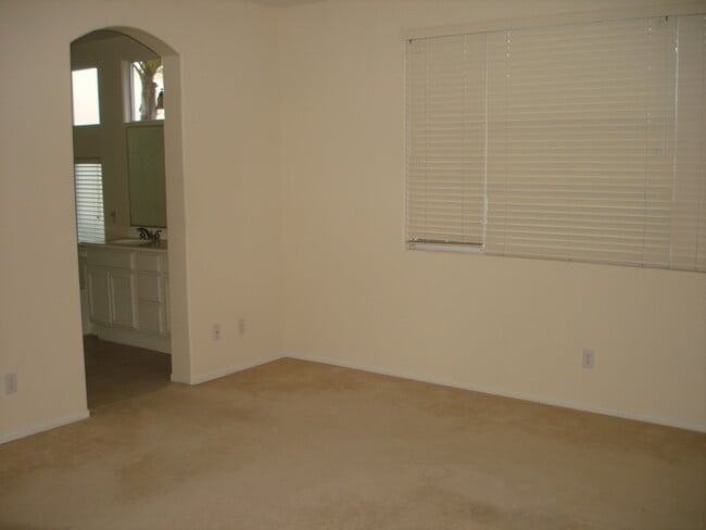 Building Photo - Amazing 4 bedroom home in gated community near highly rated schools and beach