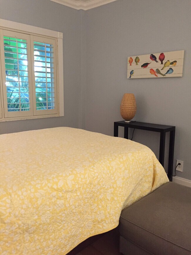 Guest Bedroom with view of lush courtyard - 6520 N Ocean Blvd