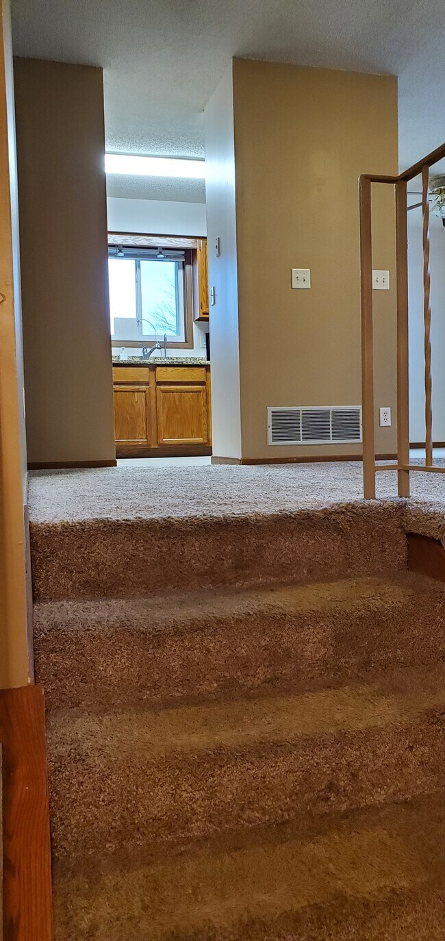 stairs to upper level - 14619 Burnell Park Dr