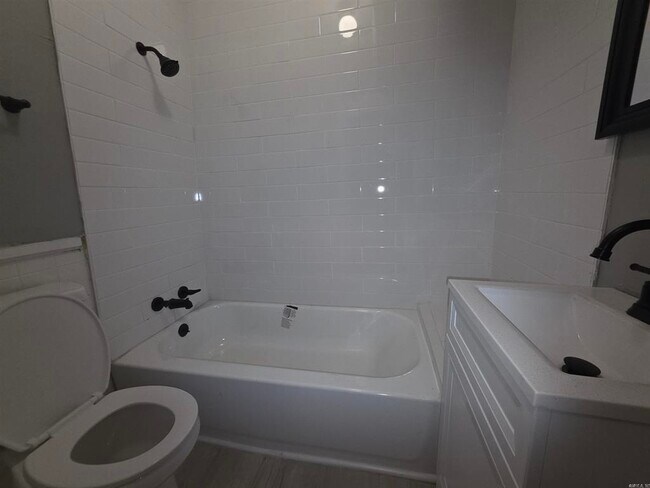 Building Photo - 1300 W 10th St