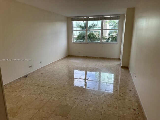 Building Photo - 6039 Collins Ave