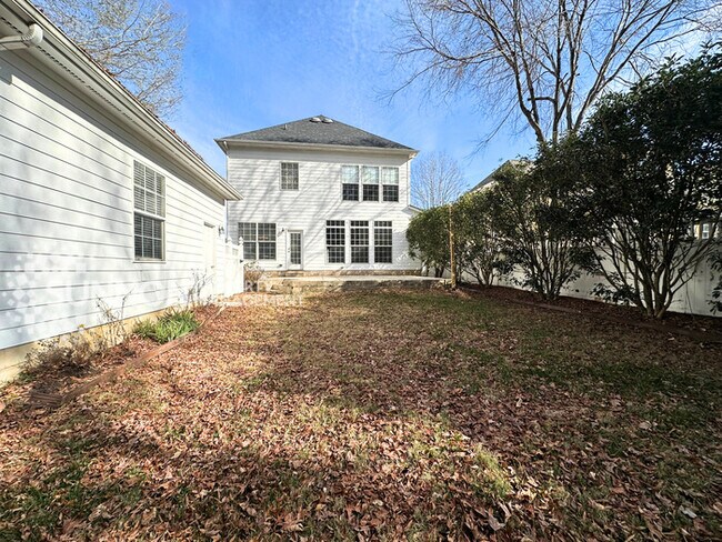 Building Photo - Wooded, Charming 3 Bedroom with Tons of Space