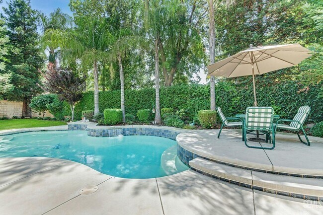 Building Photo - Brighton Estates Luxury 4-Bedroom Home with Pool, Office, Outdoor Kitchen & Paid Solar – Saves Ov...