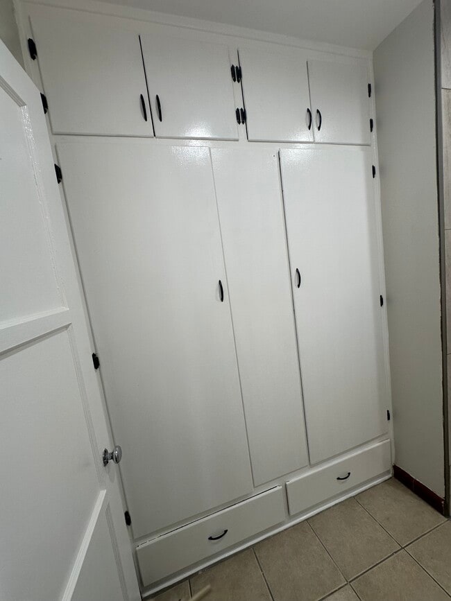 Spacious wall-to-wall closet with built-in drawers for extra storage - 5646 Farmdale Ave