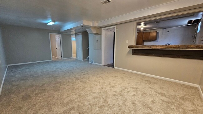 Building Photo - Spacious 5-Bedroom Ranch with Finished Basement & Oversized Garage!