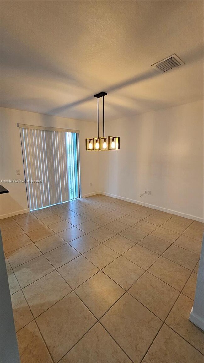 Building Photo - 8785 NW 116th Ct