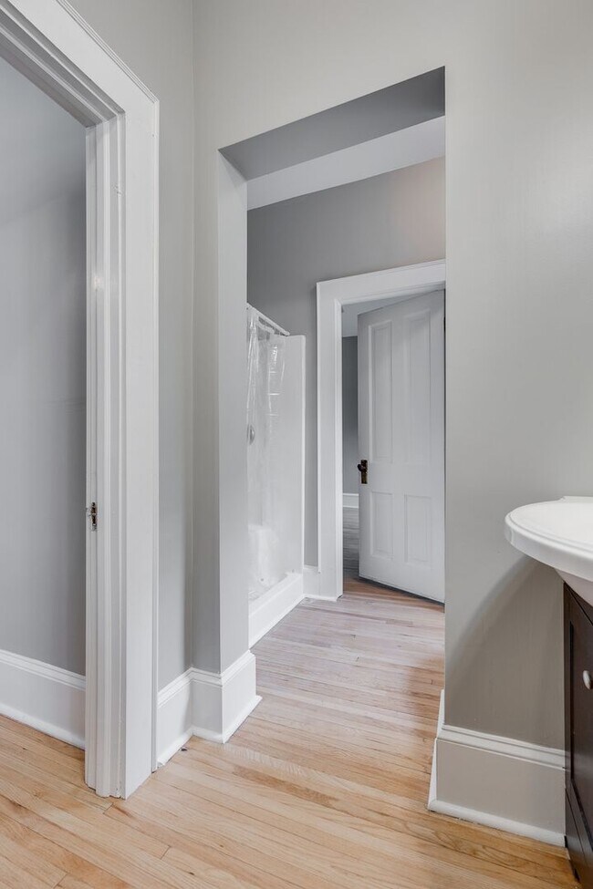 Building Photo - Historic Charm Meets Modern Living in the Heart of Lowry Hill