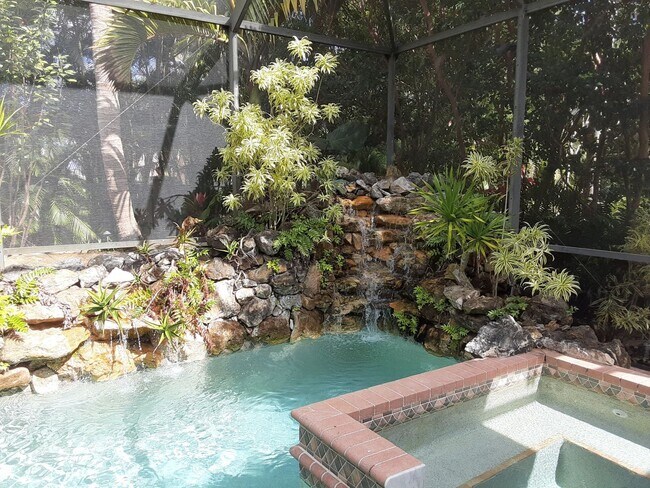 Building Photo - Annual unfurnished 3/2 SFH with pool in The Oaks!