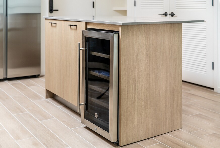 Stainless steel wine fridge in select homes - Avalon Merrick Park