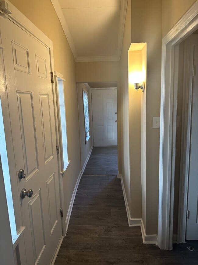 Building Photo - Four-Bedroom Bungalow with Fenced Yard Nea...