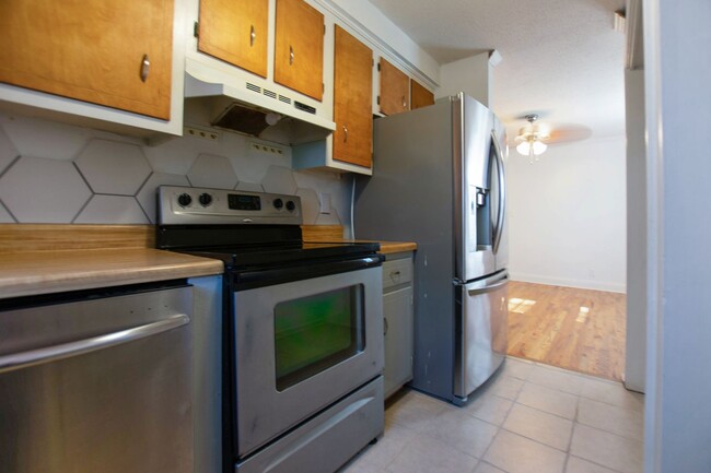 Building Photo - Pet Friendly Three Bedroom with Basement!