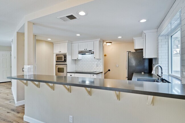 Building Photo - Welcome Home!!! - Modern and Spacious Gem!...