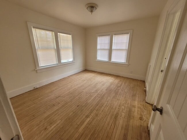 Building Photo - Super Charming - Wood Floors Throughout