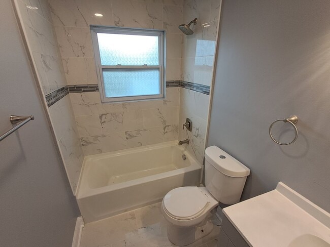 Building Photo - COMING SOON: Fully Renovated, Full of Charm — Space, Style, and a Porch Swing Vibe