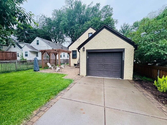 Building Photo - Charming 4-Bedroom Home with 3 Full Baths & Beautiful Hardwood Floors at 5125 Columbus Ave, Minne...