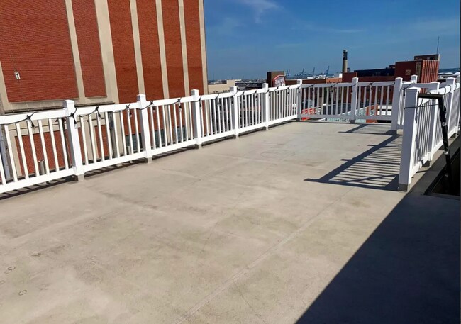 Building Photo - Beautiful EOG 3 bedroom  2.5 bath townhome with a 2 car garage and roof top deck overlooking the ...