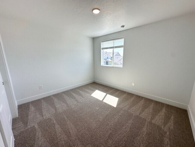 Building Photo - Spacious Luxury Townhome Designed for Modern Living available soon!