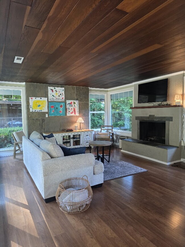 Building Photo - Breathtaking Home offers flexible living with bonus rooms ideal for an office, art studio, gym, o...