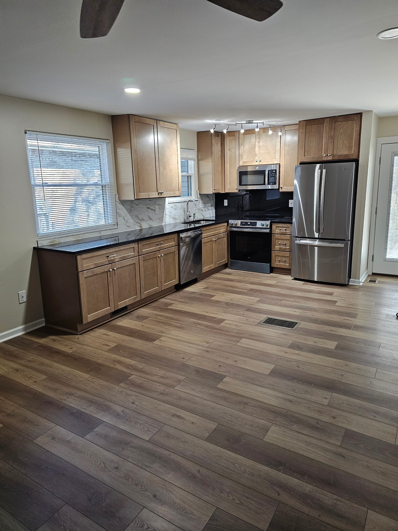 All new upgraded appliances, granite countertops, new cabinets, windows, and flooring. - 2788 Blossom Ave