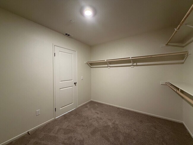 Building Photo - Modern 4 Bedroom 3 Bathroom Living with INCLUDED Solar & Entertainer’s Backyard