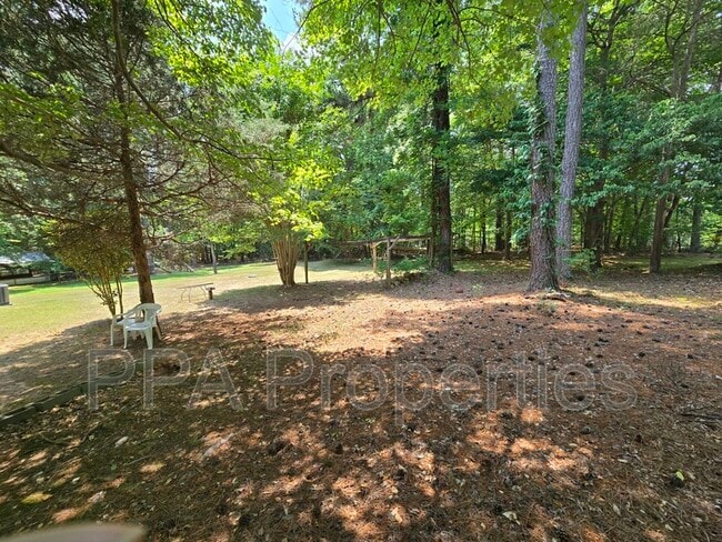 Building Photo - 7122 Ramblewood Dr