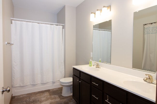 Building Photo - Crossing Commons Apartments