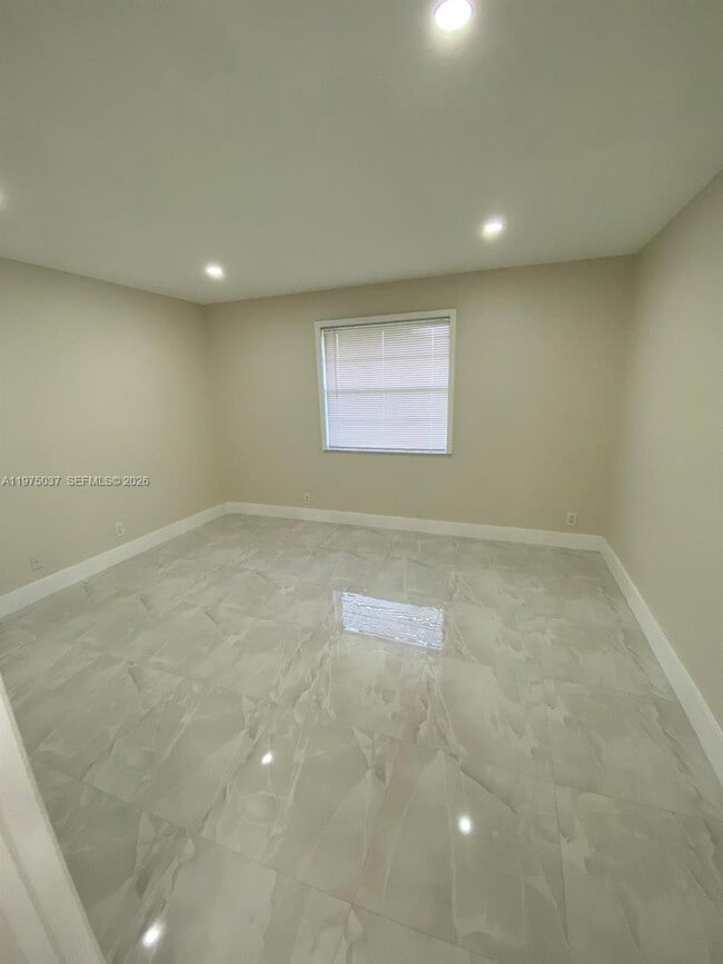 Building Photo - 8830 Royal Palm Blvd