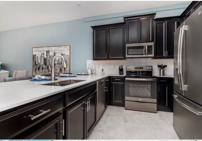 Building Photo - BEAUTIFUL CHAMPIONS GATE 2 BED 2 BATH COND...
