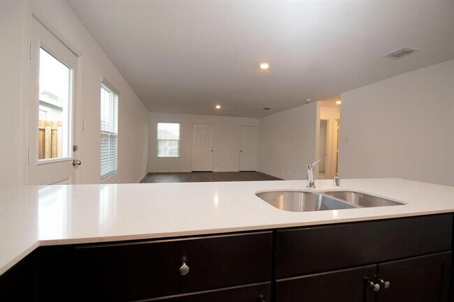 Building Photo - 5701 Manarchos Ln