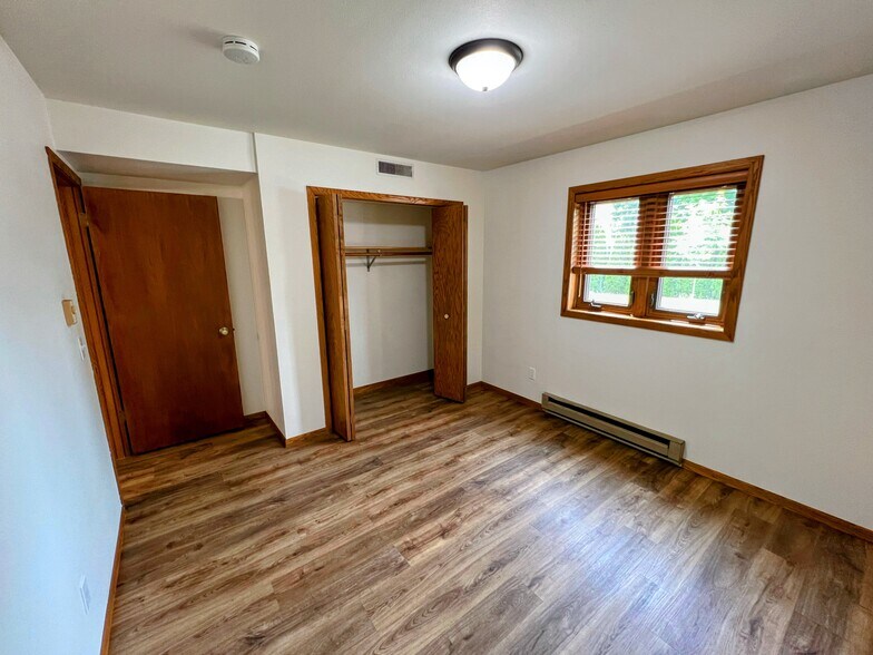 second bedroom ideal for a guest room, home office, or nursery. - 213 Ash Street