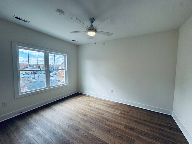 Building Photo - Brand New Luxury Condo - Top Floor