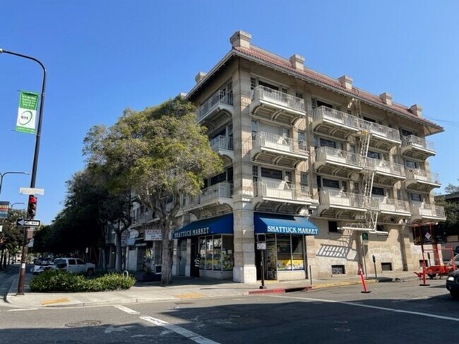 Building Photo - Spacious, Studio, One Bath Unit, with upgraded floors, above commercial shops
