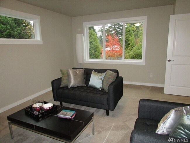 Large bedroom/bonus room upstairs. - 15828 25th Ave NE