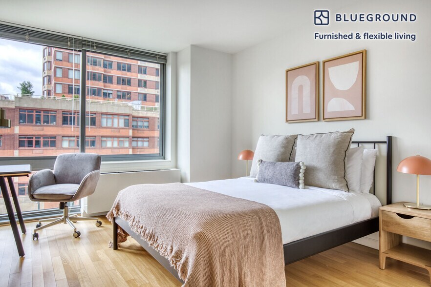 Building Photo - 4-75-75 48th Ave