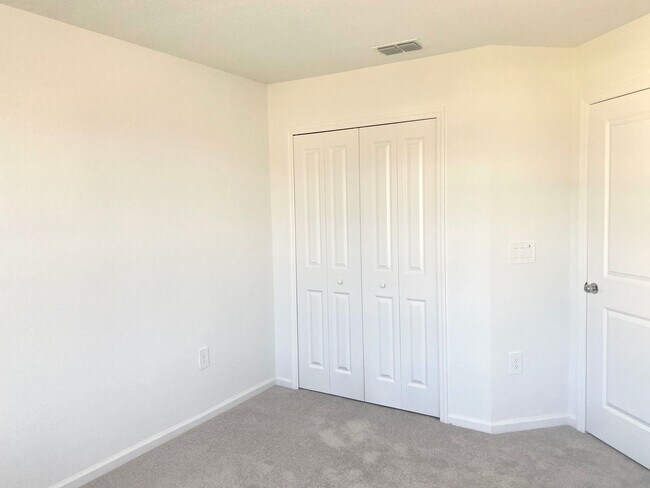 Building Photo - Almost New 3/2/1 Modern Townhome!